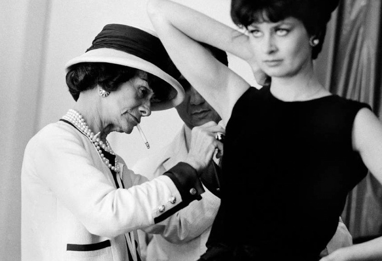 Coco Chanel working in her Paris atelier in 1962, shot by Douglas Kirkland