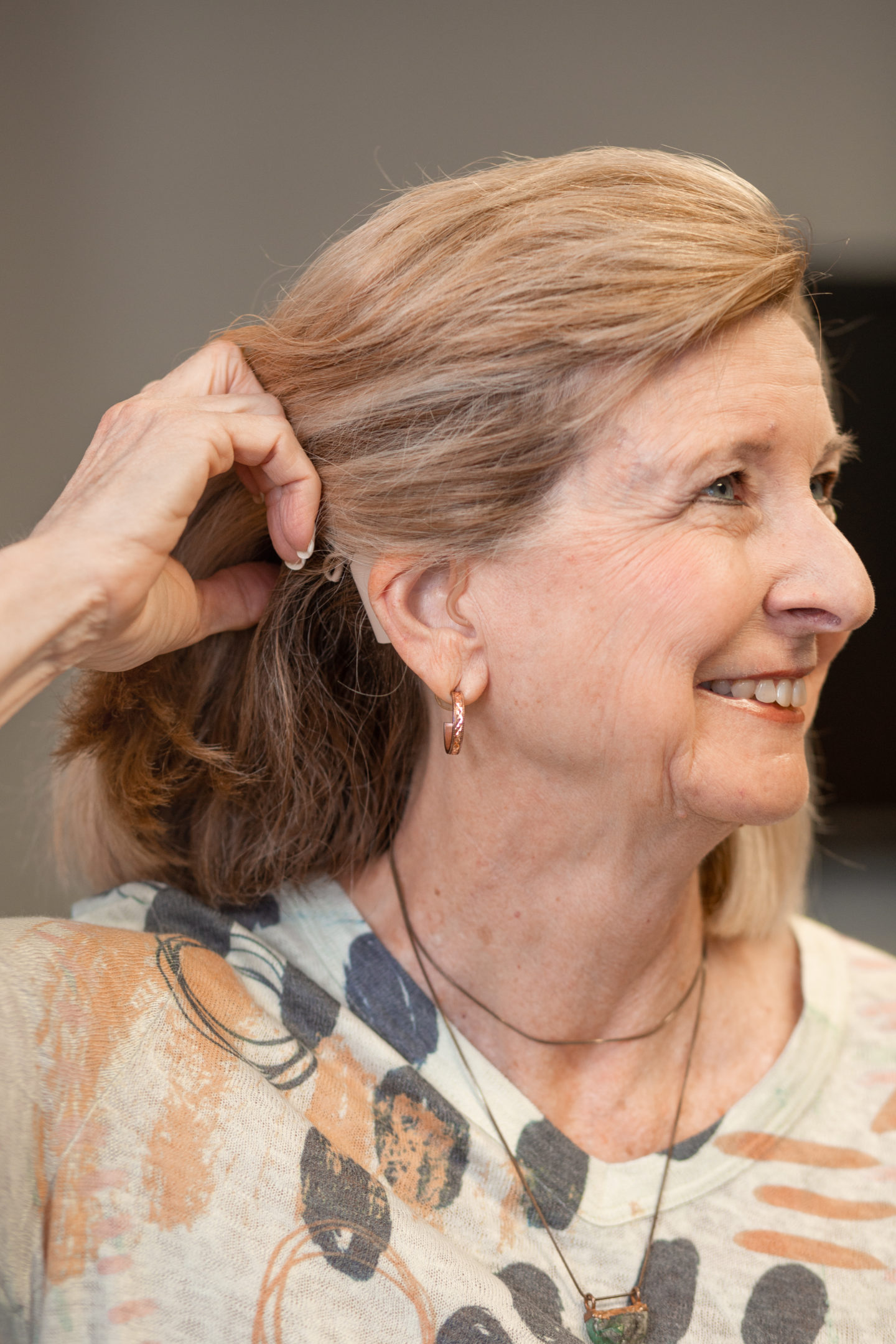 Robin showing us her cochlear implant