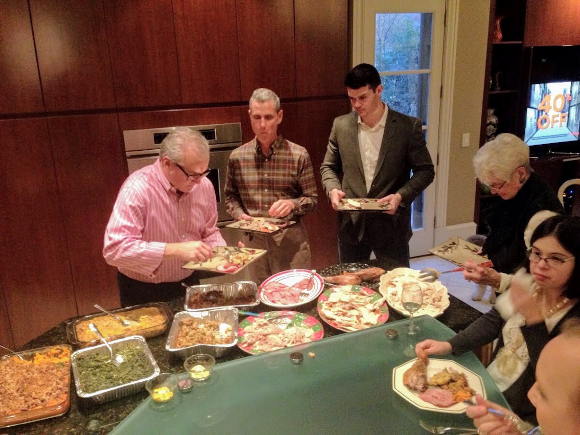 Thanksgiving food is laid out buffet style in the kitchen