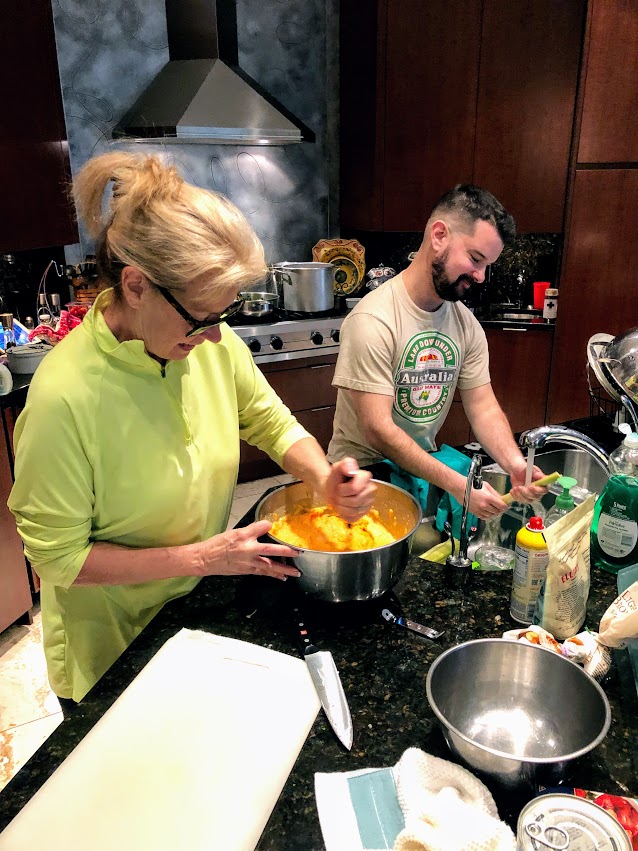 Robin and her son Alex preparing Thanksgiving side dishes