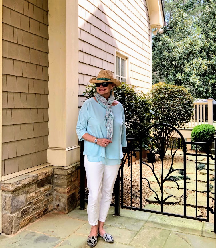 Robin is wearing a scarf that she wears to cover her face when shopping