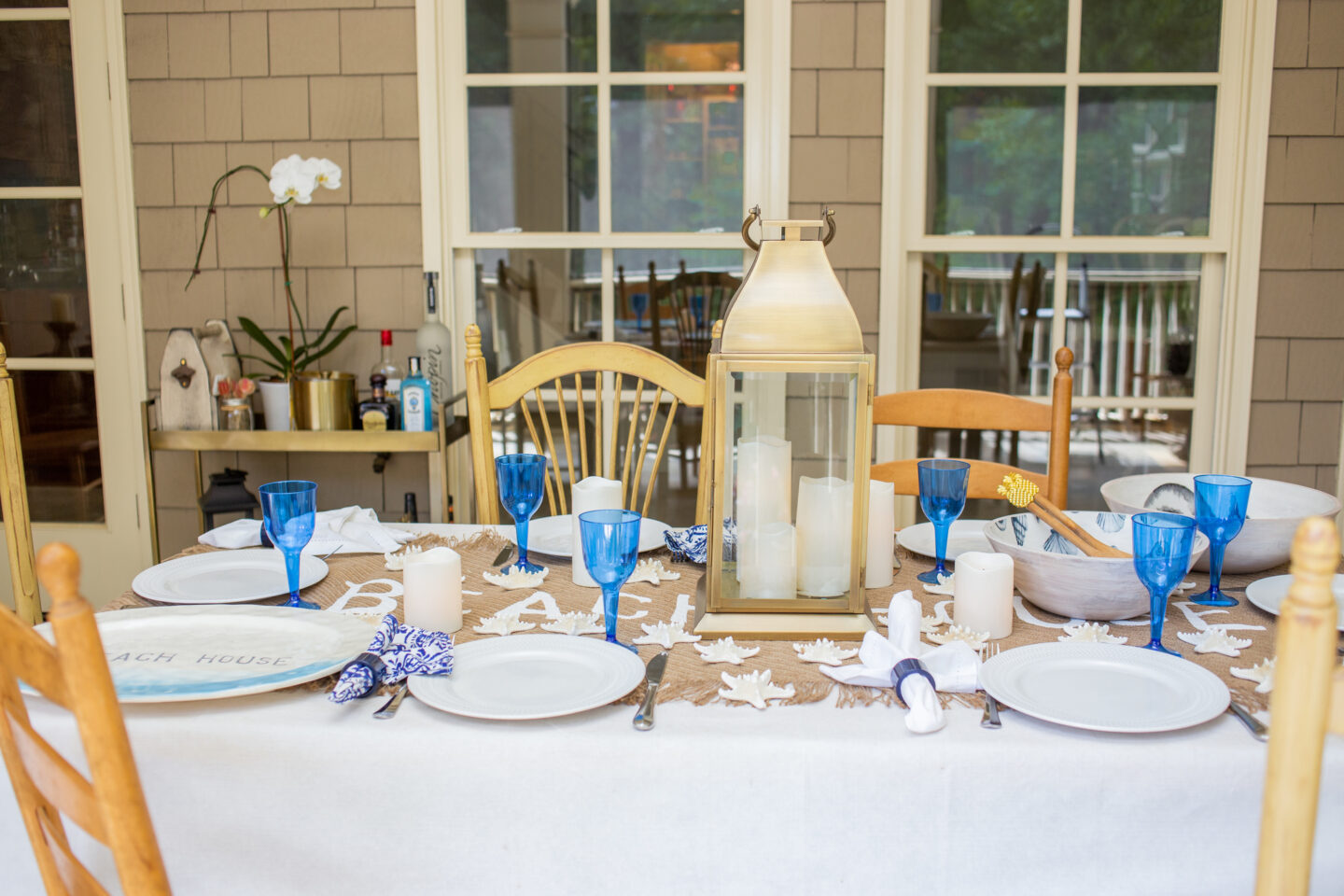 Keeping the color scheme to blue and white is very beachy.