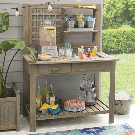 Walmart potting table used as an outdoor bar