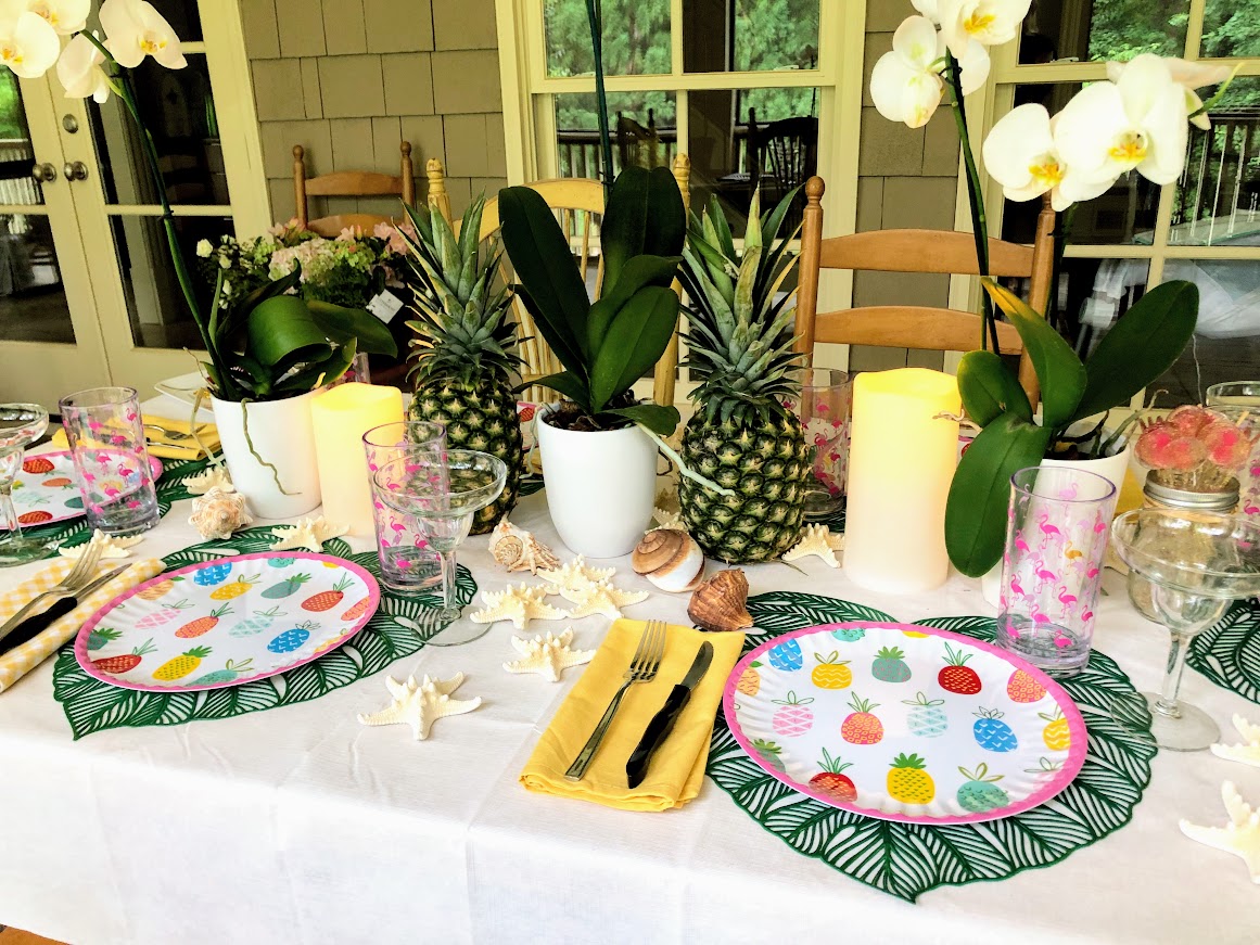 Hawaain themed table using melamine and plastic dinnerware and glasses
