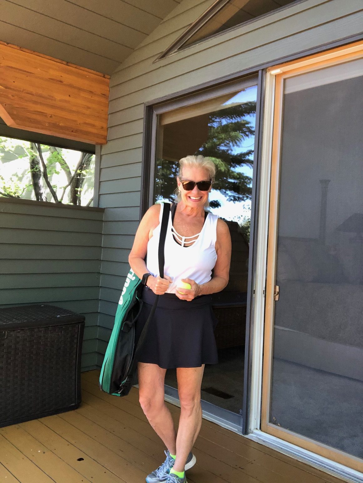 I am wearing the Kinsei Tank (backward) and the Yuko Skort for Peach's summer collection. The Kinsei Tank also comes in neon green and is so light and airy. It's perfect so exercising in the summer outdoors!