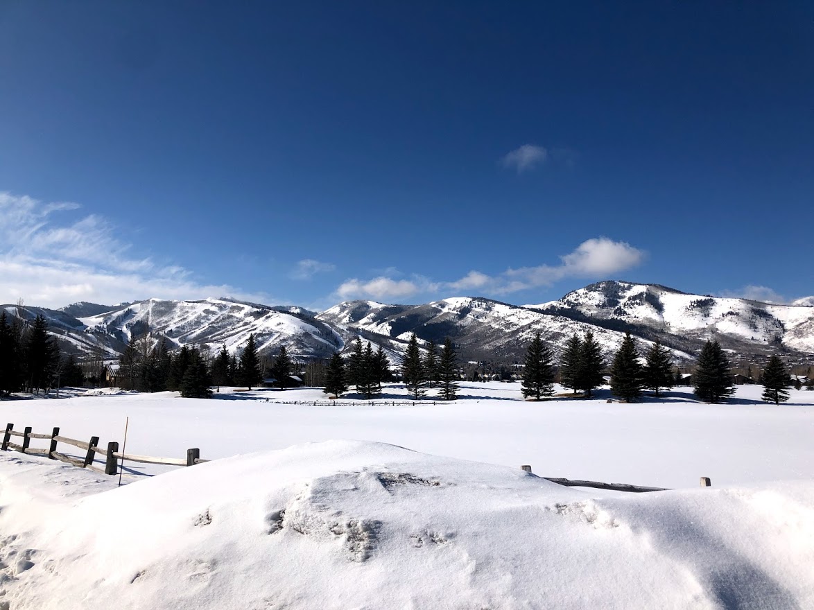 A view from our home overlooking the golf course and the mountains in Park City.