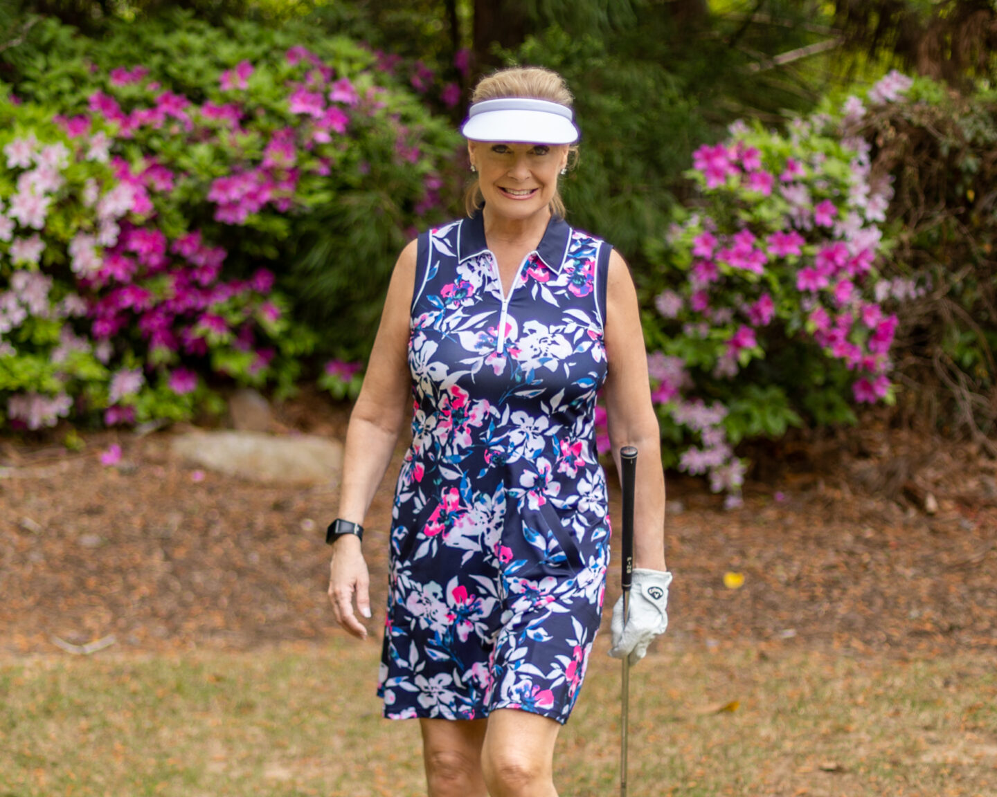 Wearing sleeveless polo dress from Jofit's Rojito Collection