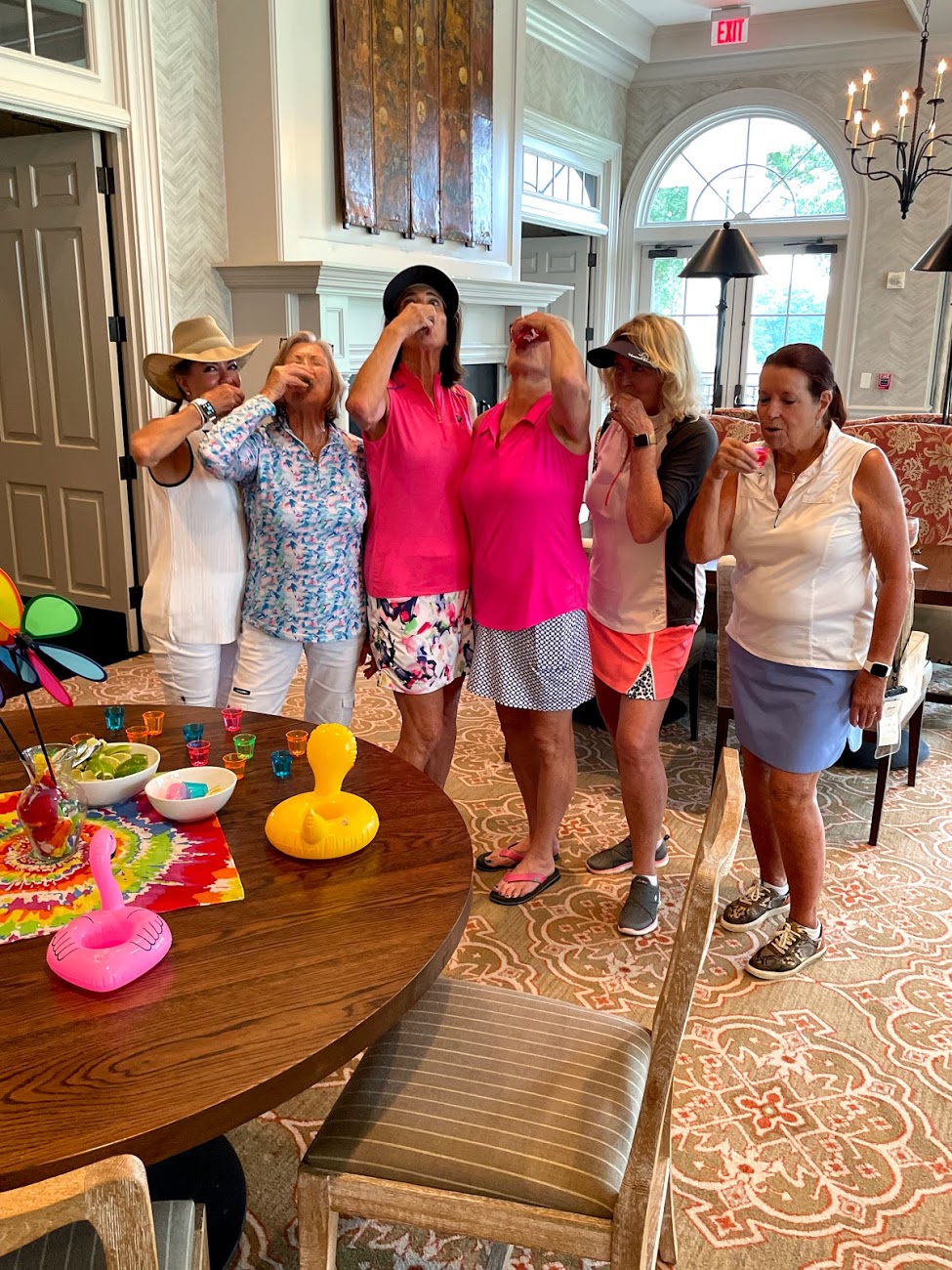 Having tequila shots after playing 9 holes of golf.