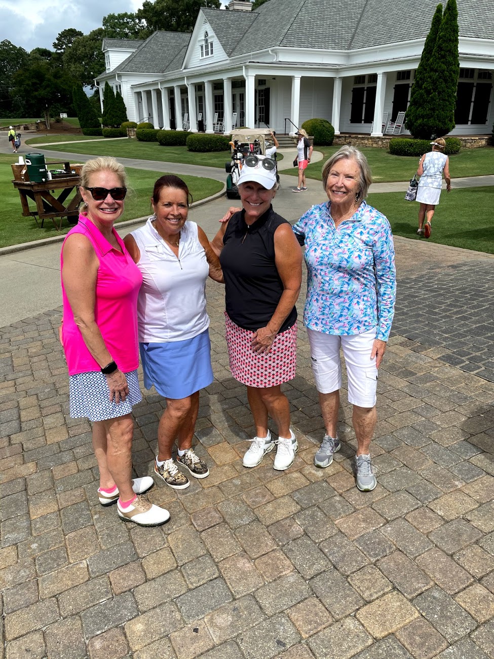 Wearing Pink polo shirt and Mina skort from Jofit's Rojito Collection