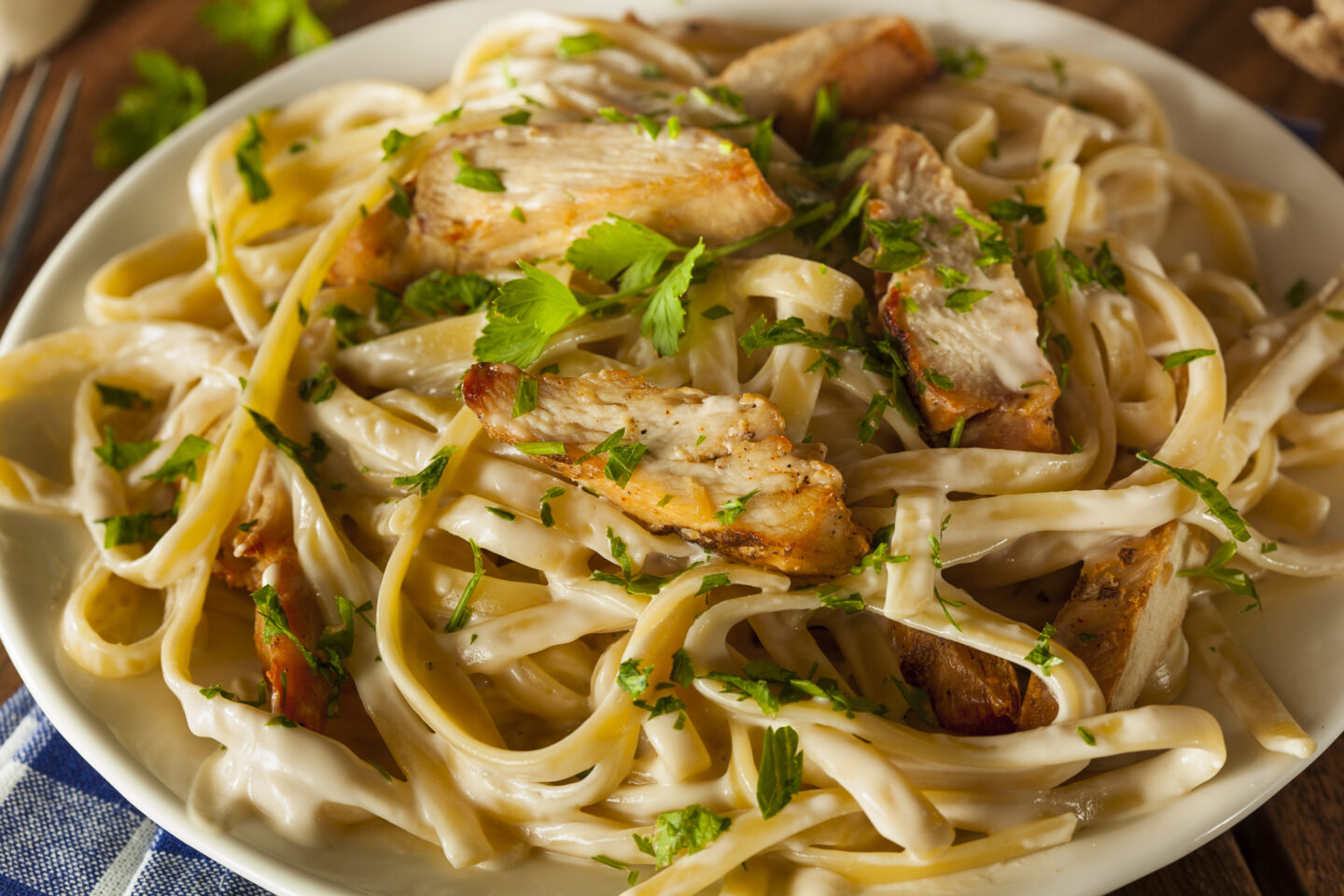 Homemade Fettuccine Aflredo Pasta with Chicken and Parsley