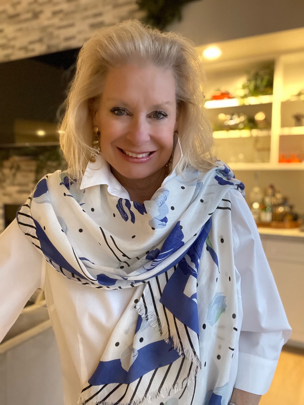 Robin is wearing a periwinkle print scarf