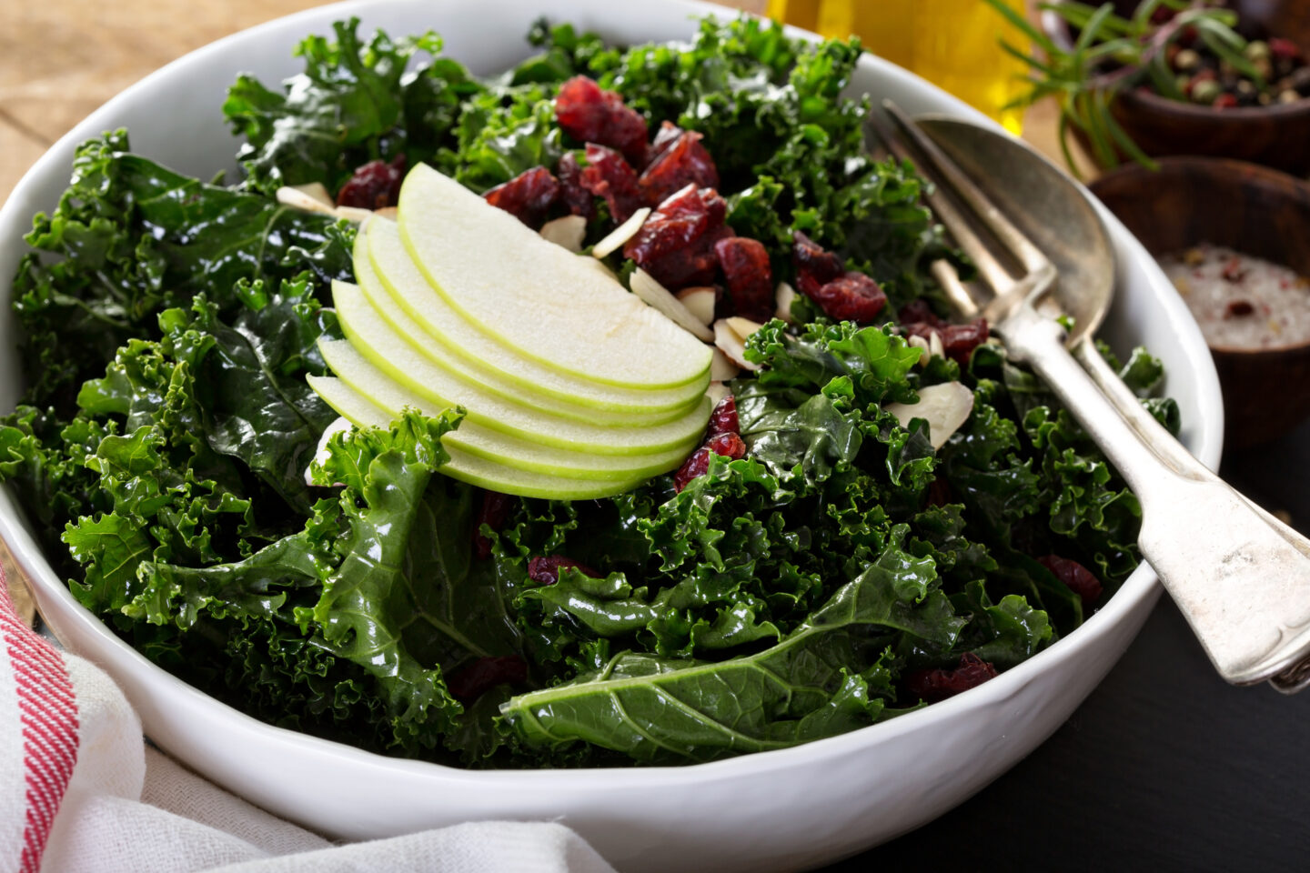 Kale salad with dried cranberry, almonds and apple