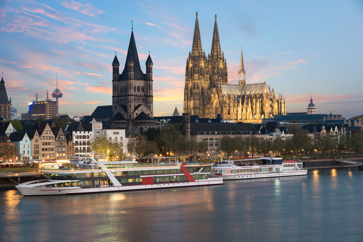 Aerial view of Cologne over the Rhine River with cruise ship in Cologne, Germany.