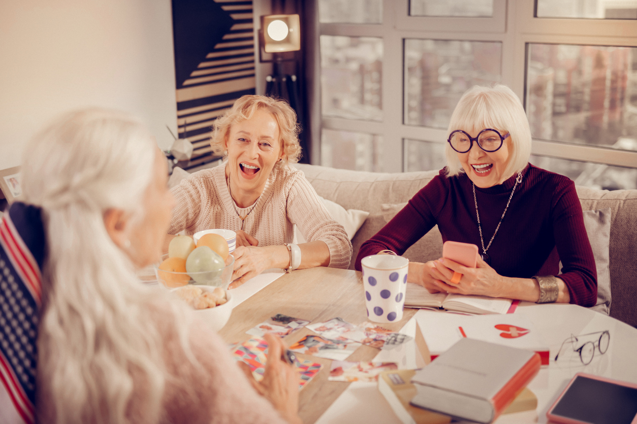Women attending a book club party